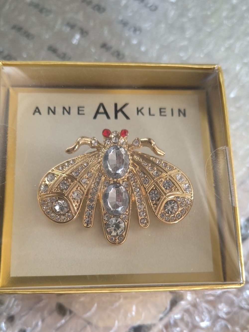 Anne Klein Gold Tone Crystal Bee Brooch with Red Accent